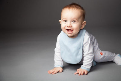 our bibs are a new baby staple. here's why...